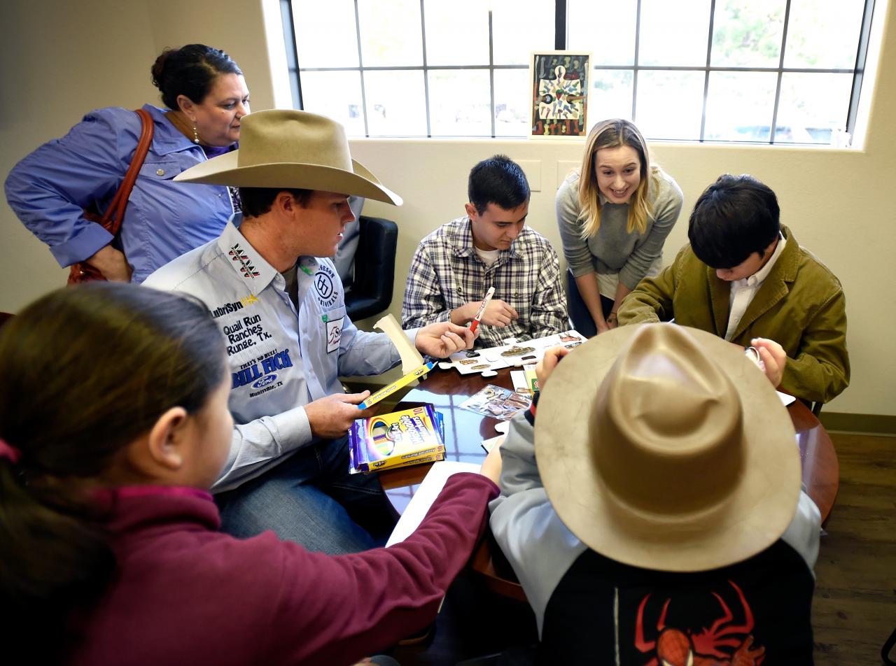 Jacobs Crawley and Caleb Smidt visit the kids at Grant a Gift Autism Foundation